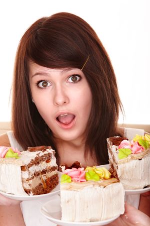 Girl with chocolate cake.  Isolated.の写真素材