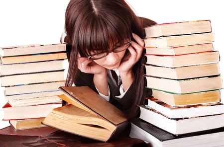 Clever girl with group book. Isolated.の写真素材