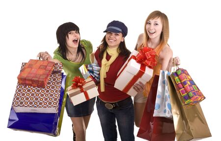 Three beautiful girlfriends enjoy shopping. Isolated.の写真素材