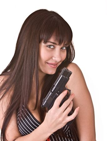 Beautiful young women with gun. Isolated.の写真素材