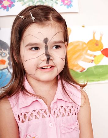  Child with paint of face. Make up.の写真素材