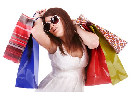 Girl in white glasses with shopping bag. Isolated.の写真素材