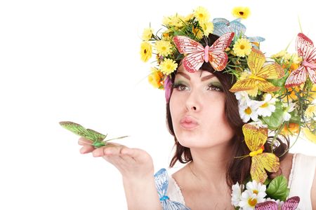 Girl with flower and  butterfly on hand.  Isolated.の写真素材