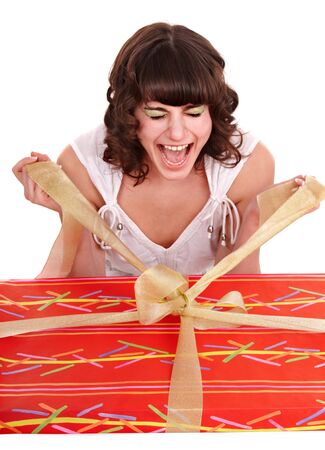 Girl with big red gift box. Isolated.の写真素材