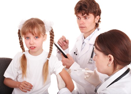  Doctor inject inoculation to child. Isolated.の写真素材