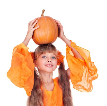 Girl in orange long dress with pumpkin  at thanksgiving.Isolated.の写真素材
