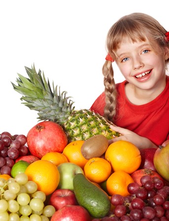 Child girl with group of  fruit. Isolated.の写真素材