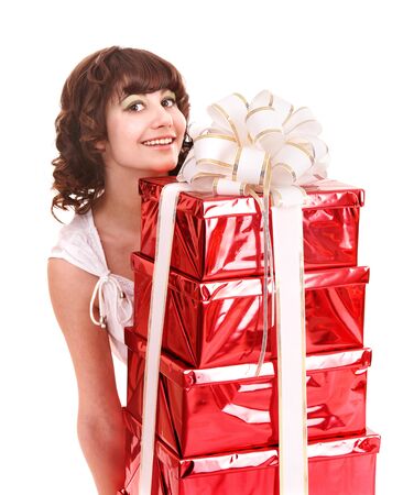 Young woman holding stack gift box. Isolated.の写真素材
