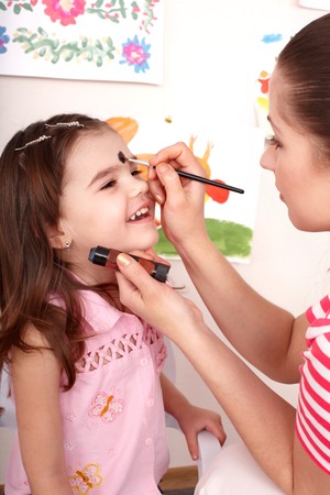 Child preschooler with face painting. Child care.の写真素材