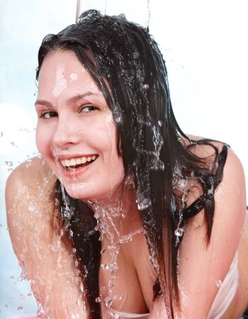 Beautiful girl with wet hair. Isolated.の写真素材
