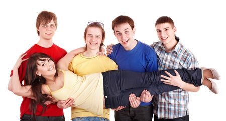 Men hold girl on hands. Group people.の写真素材