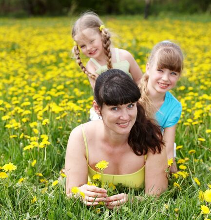 Mother with two daughter in outdoor. Happy family.の写真素材