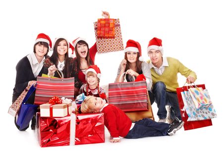  Happy group people with children in santa hat .  Isolated.の写真素材