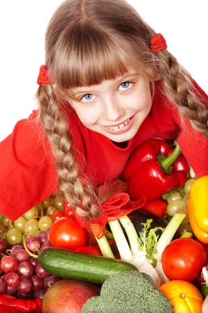 Little girl with group of vegetable and fruit. Isolated.の写真素材