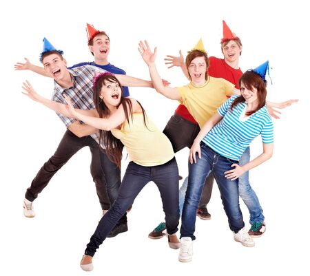 Group of teenager in party hat. Isolated.の写真素材