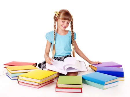 Child with pile of books  reading on floor. Isolated.の写真素材