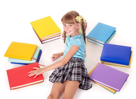 Little girl  with open book lying on floor.の写真素材