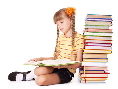 Schoolgirl  reading pile of books. Isolated.の写真素材