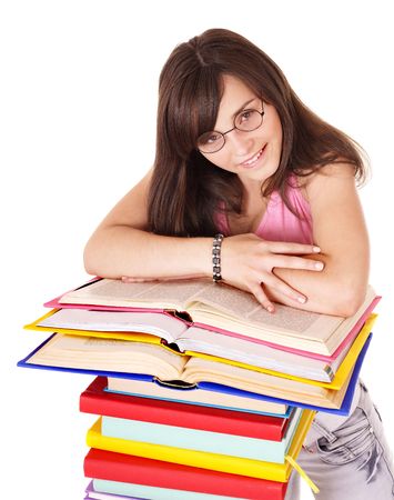 Girl with pile colored book . Isolated.の写真素材