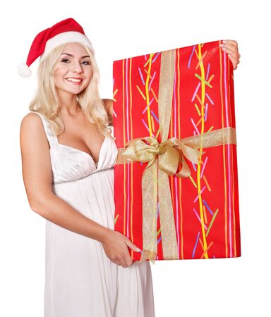 Christmas girl in santa hat holding red gift box. Isolated.の写真素材