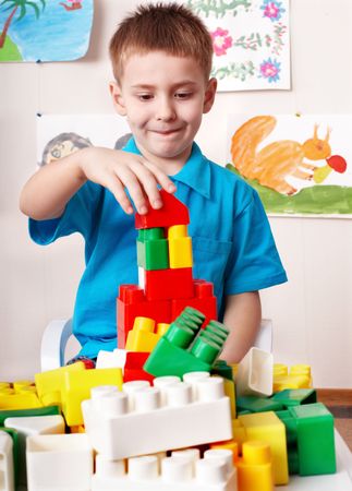 Little girl play construction set .の写真素材