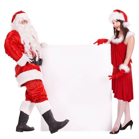 Santa claus and christmas girl holding banner. Isolated.の写真素材