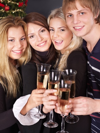 Group young people drink champagne at nightclub.の写真素材