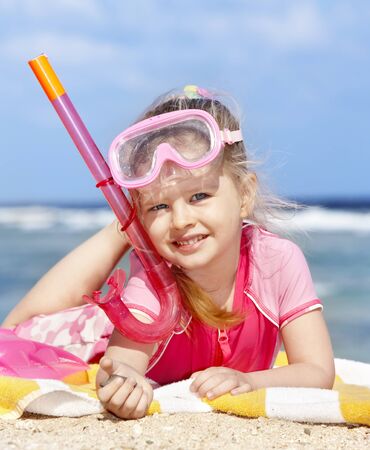 Little girl  playing on  beach.の写真素材