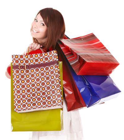 Girl holding group shopping bag. Isolatedの写真素材