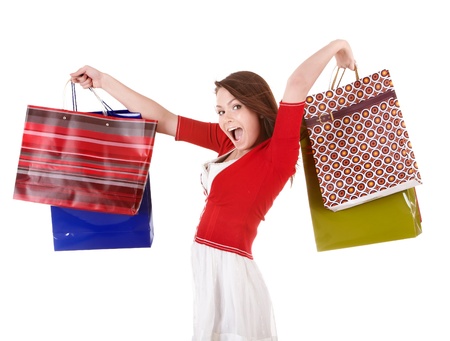 Shopping girl with group bag. Isolated.の写真素材