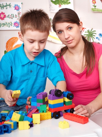 Little boy playing  lego  block with mother at home. の写真素材
