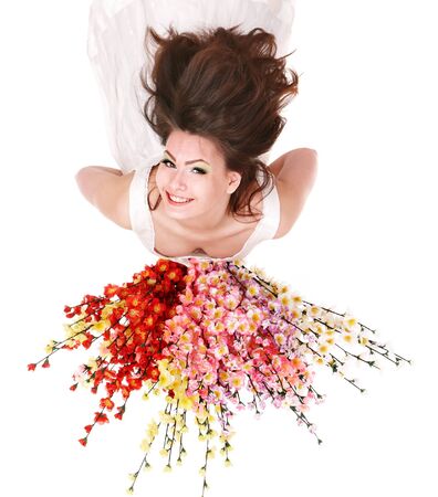 Beautiful young woman with spring flower.の写真素材
