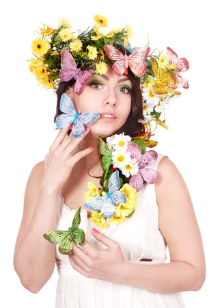 Girl with butterfly and flower on head. Spring hair. Isolated.の写真素材
