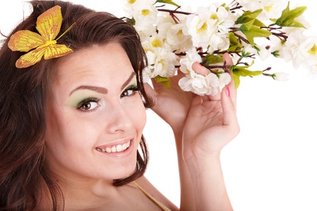  Beautiful girl with spring flower and butterfly. Isolated.の写真素材
