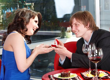 Man propose marriage to girl. Loving couple.の写真素材