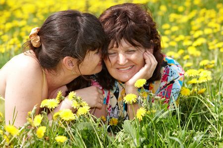 Grandmother with daughter in outdoor. Summer.の写真素材