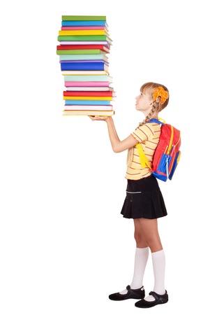 Schoolgirl with backpack holding stack of books. Isolated.の写真素材