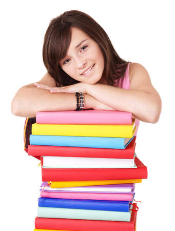 Girl with pile colored book . Isolated.の写真素材