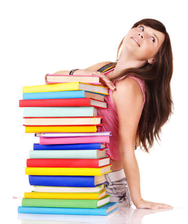 Girl with stack colored book . Isolated.の写真素材