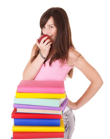 Girl with pile colored book . Isolated.の写真素材