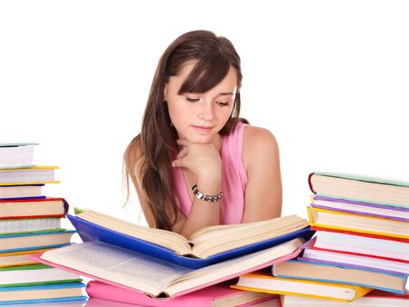 Girl with pile colored book . Isolated.の写真素材