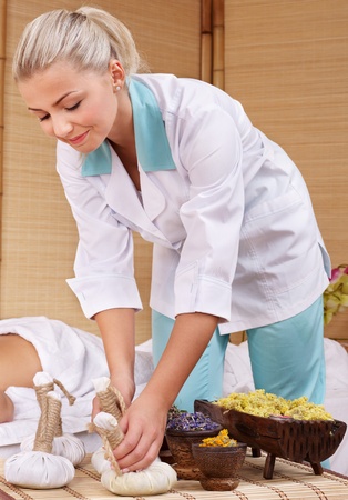Young beautiful woman on massage table in beauty spa. Series.の写真素材