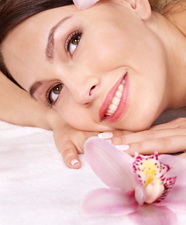 Young beautiful woman on massage table in beauty spa. Series.の写真素材