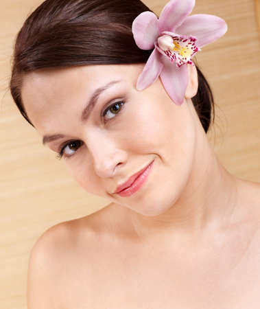 Young beautiful woman on massage table in beauty spa. Series.の写真素材