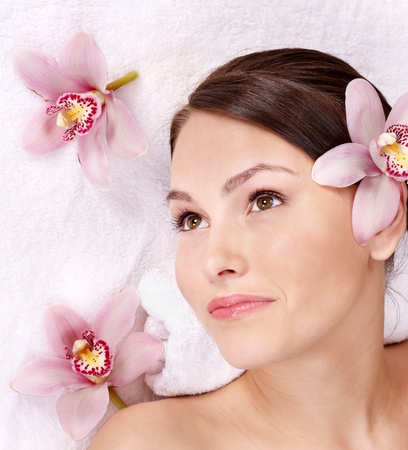 Beautiful young woman having massage.の写真素材