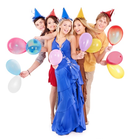 Group of young people in party hat holding balloon. Isolated.の写真素材