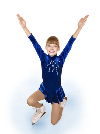 Happy young girl figure skating. Isolated.の写真素材