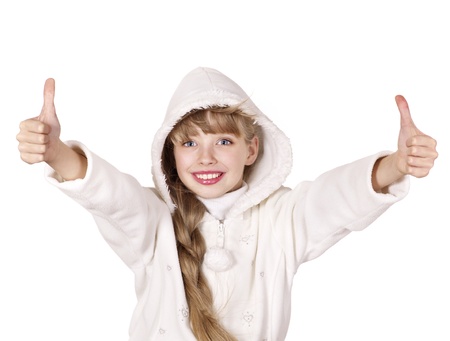 Young girl in white winter jacket showing thumb up. Isolated.の写真素材
