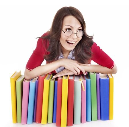 Girl in glasses with pile book . Isolated.の写真素材