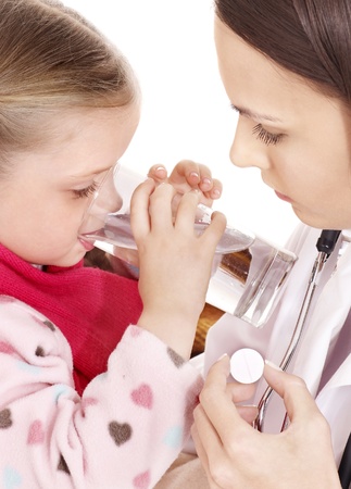 Sick child take  medicine with doctor. Isolated.の写真素材
